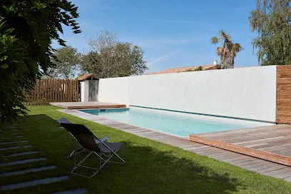 Image de Portelli - Pisciniste Toulouse - Construction de piscine - Paysagiste - Mobilier de jardin